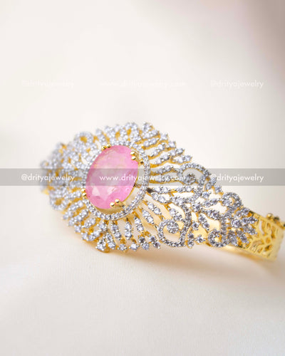 Close-up of diamond replica kada showing intricate stone-studded pattern around pink centerpiece, SKU 1295-BP