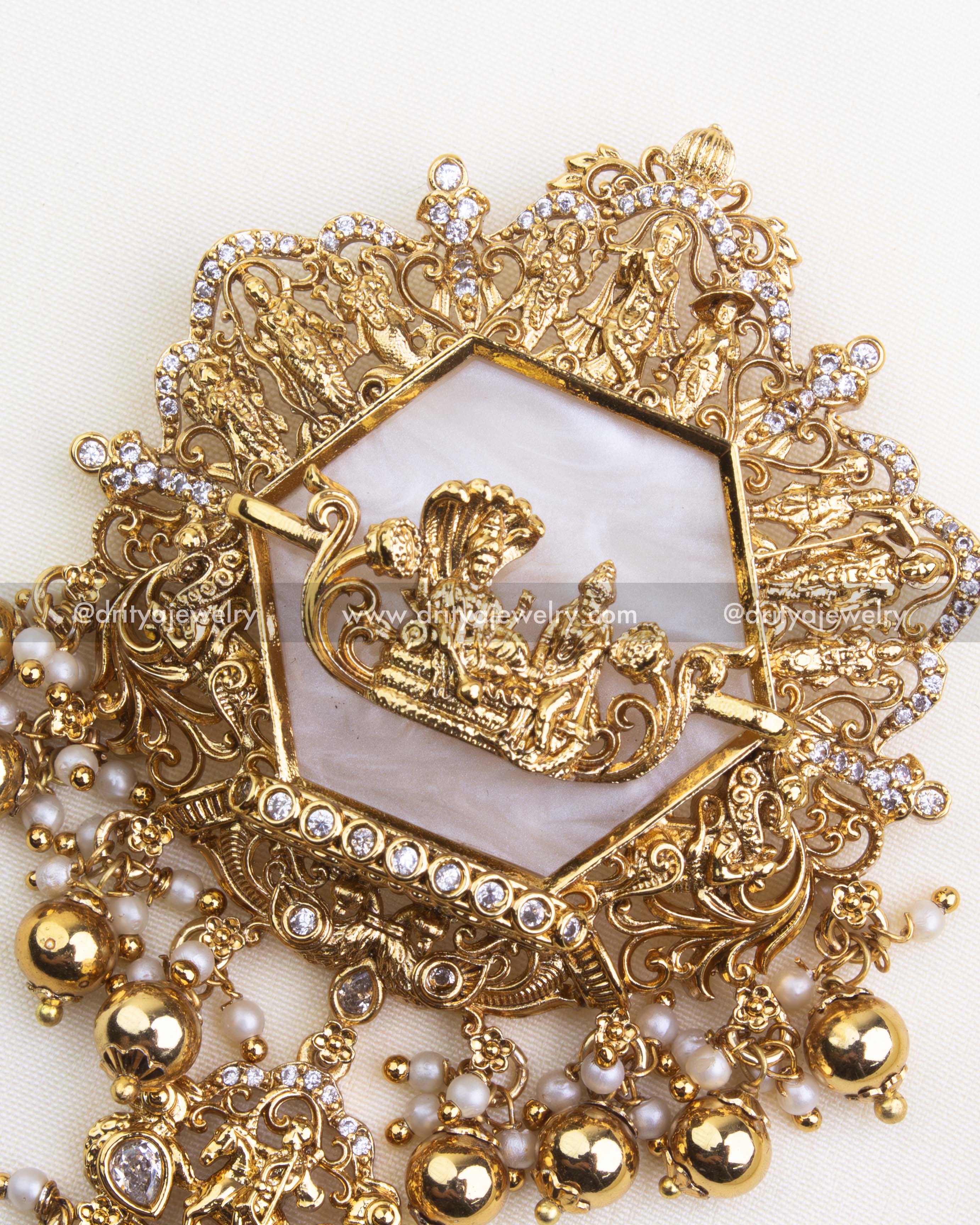 SKU 1100 Necklace Set close-up of Vishnu god idol pendant with white marble-style backing and bead drops