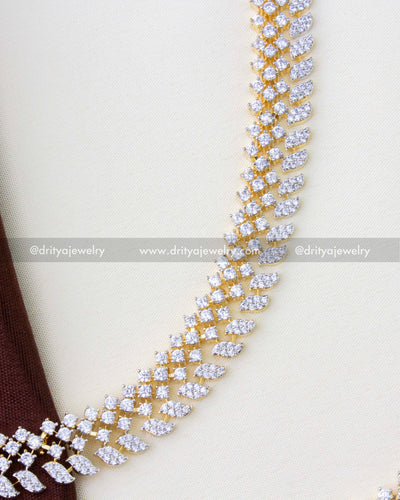 1272 - Close-up of premium CZ champaswaralu hair chain with dual-tone finish