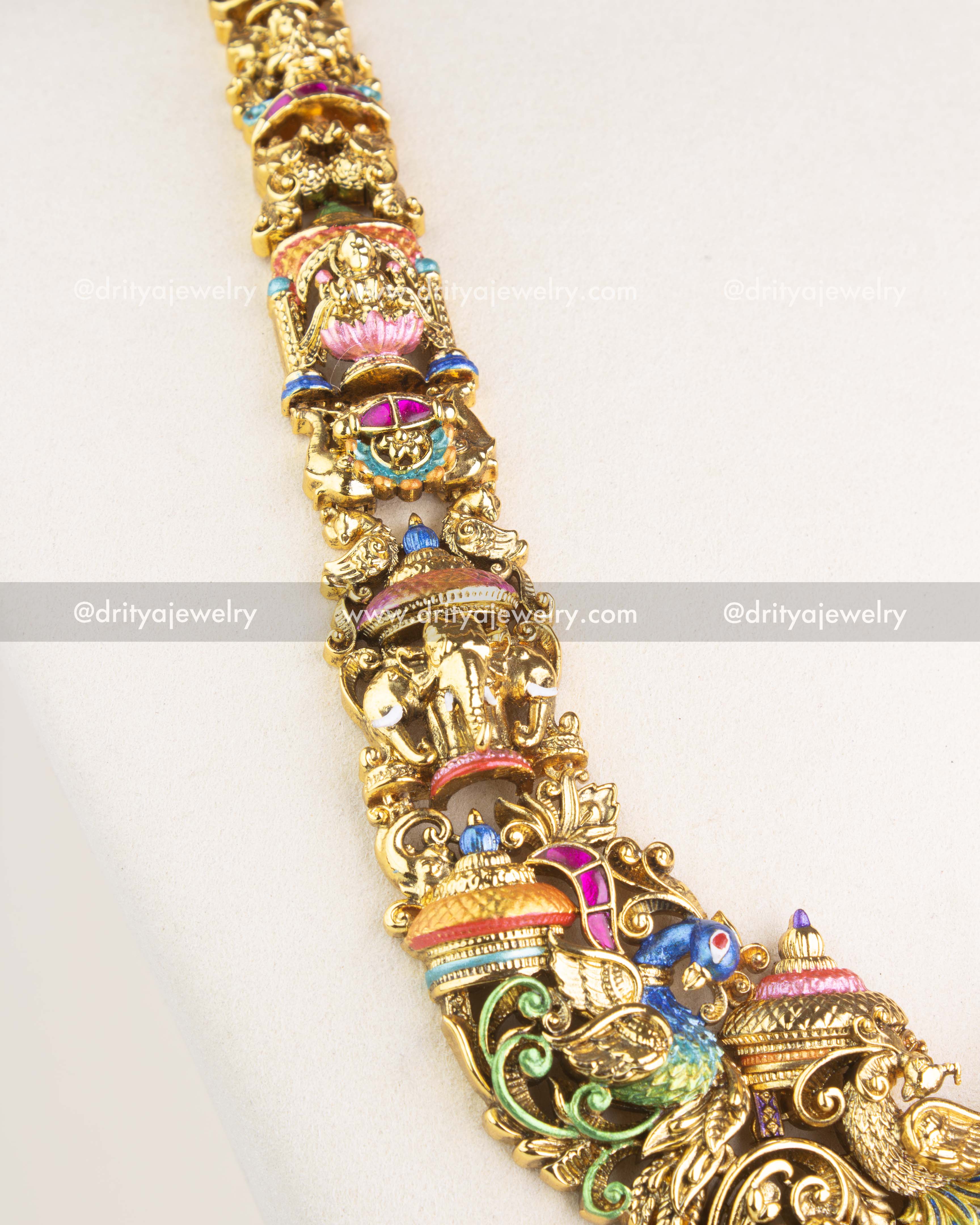 SKU 1118 Necklace Set detailed view of upper haram links with miniature deity and elephant motifs