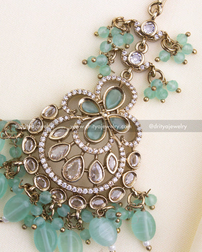 610-MG close-up of Victorian maang tikka showing stone-studded detailing and mint green bead drops