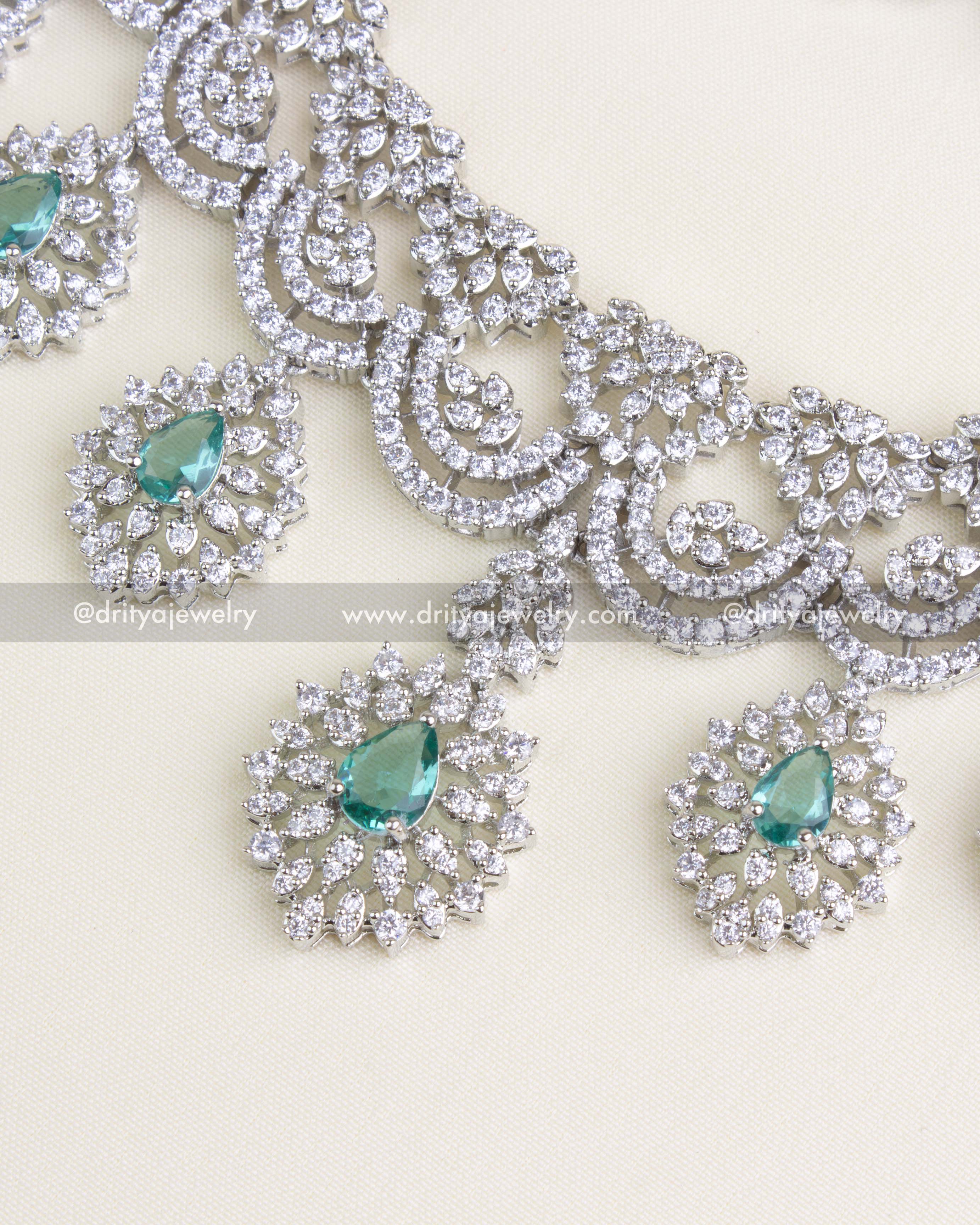SKU 1136 Necklace Set - Side angle of necklace and detachable emerald-tone pendants