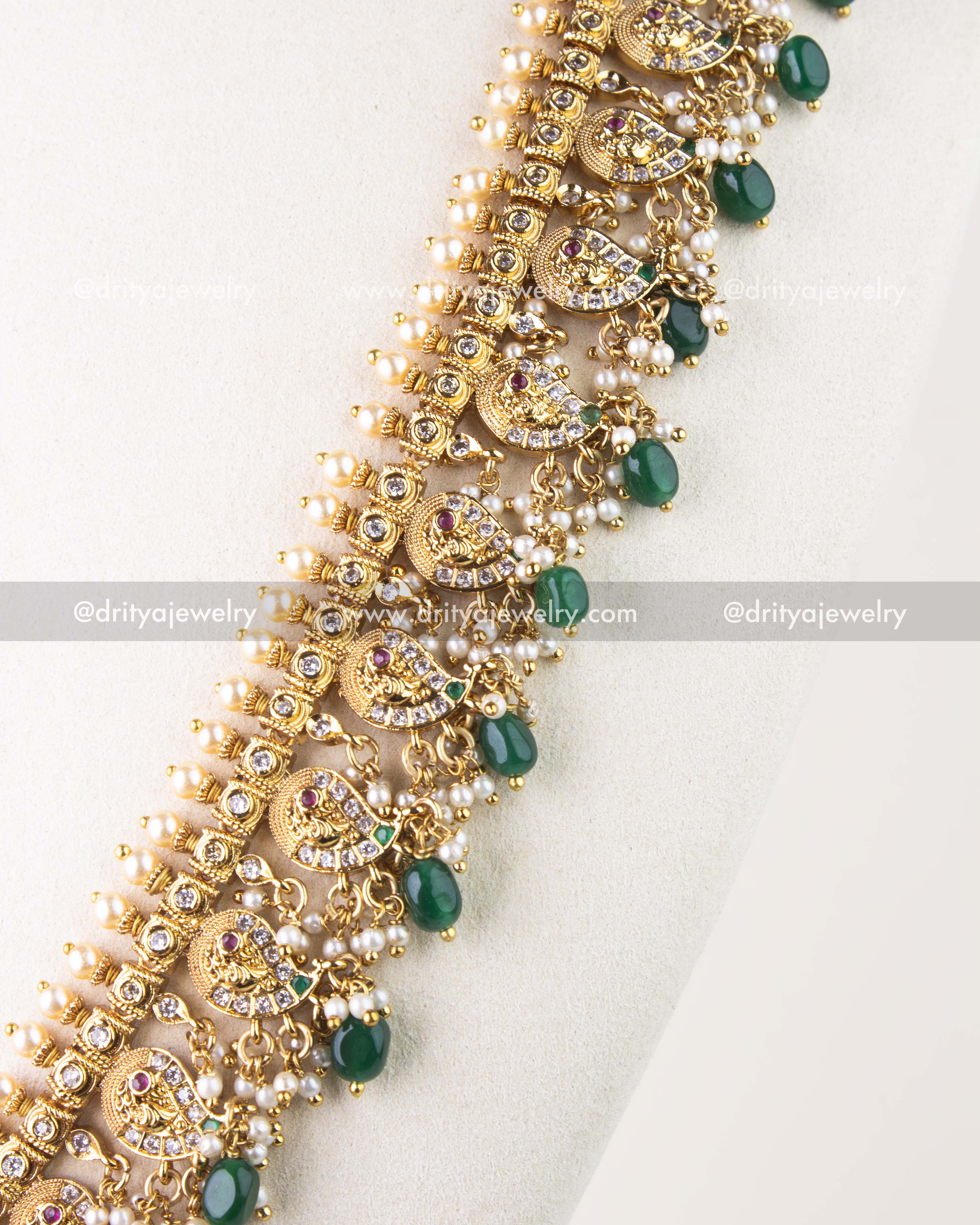 1261-G side view of mango motif links with pearls and green beads