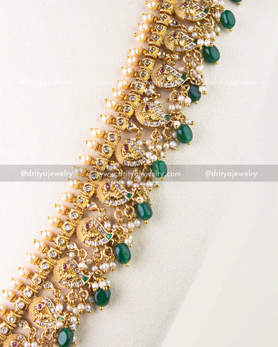 1261-G side view of mango motif links with pearls and green beads