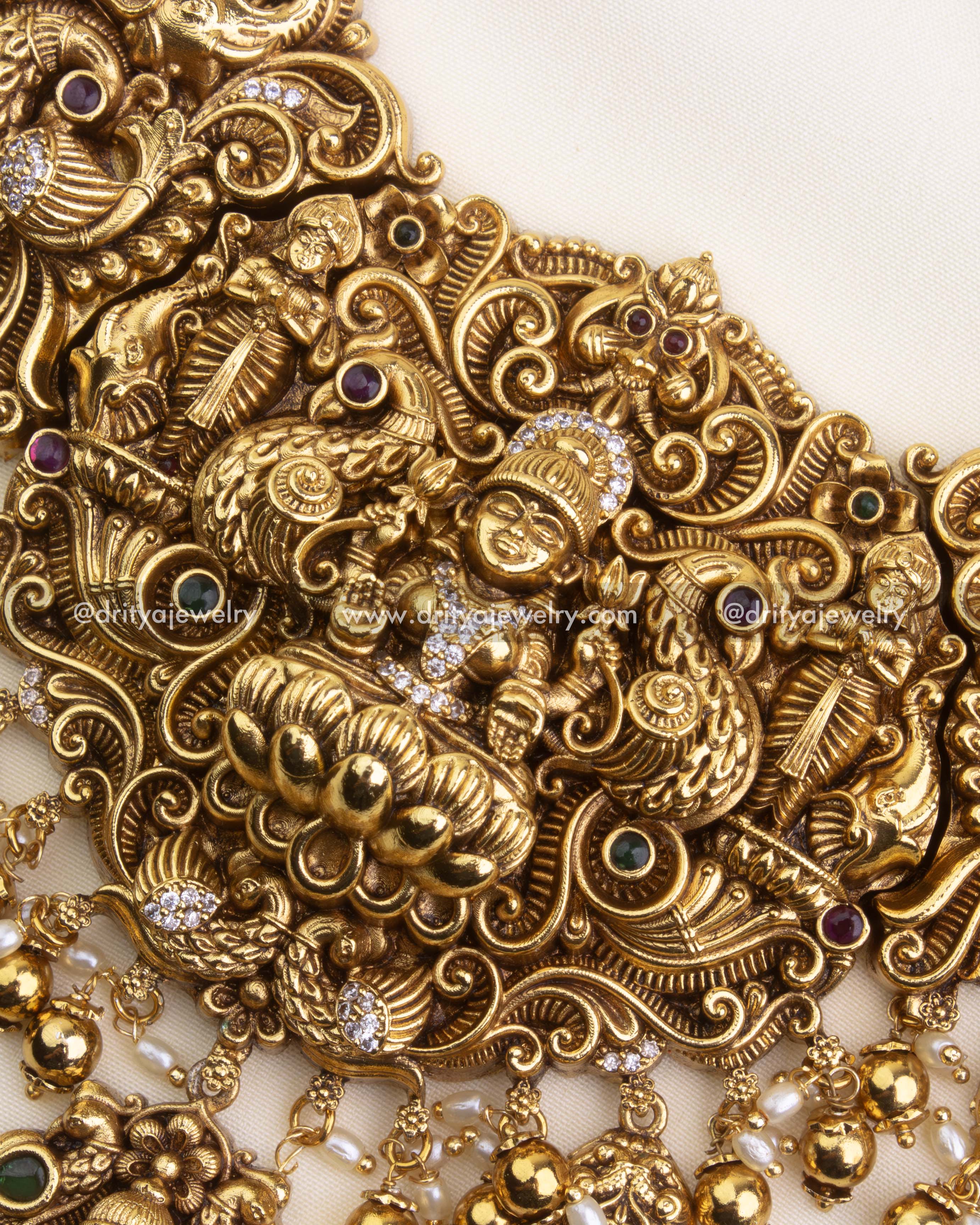 SKU 1167 close-up of central god idol and lotus motif on necklace