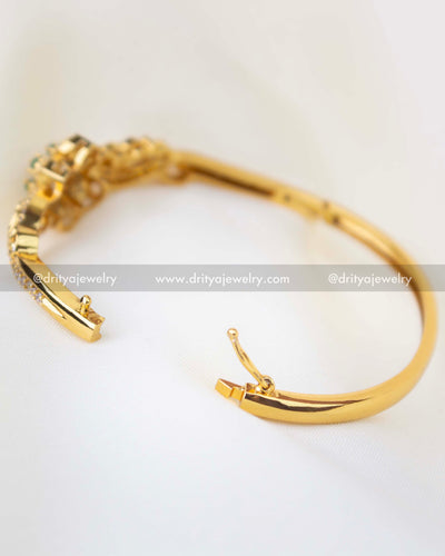 SKU 1256 openable floral kada bangle showing hinge and latch mechanism