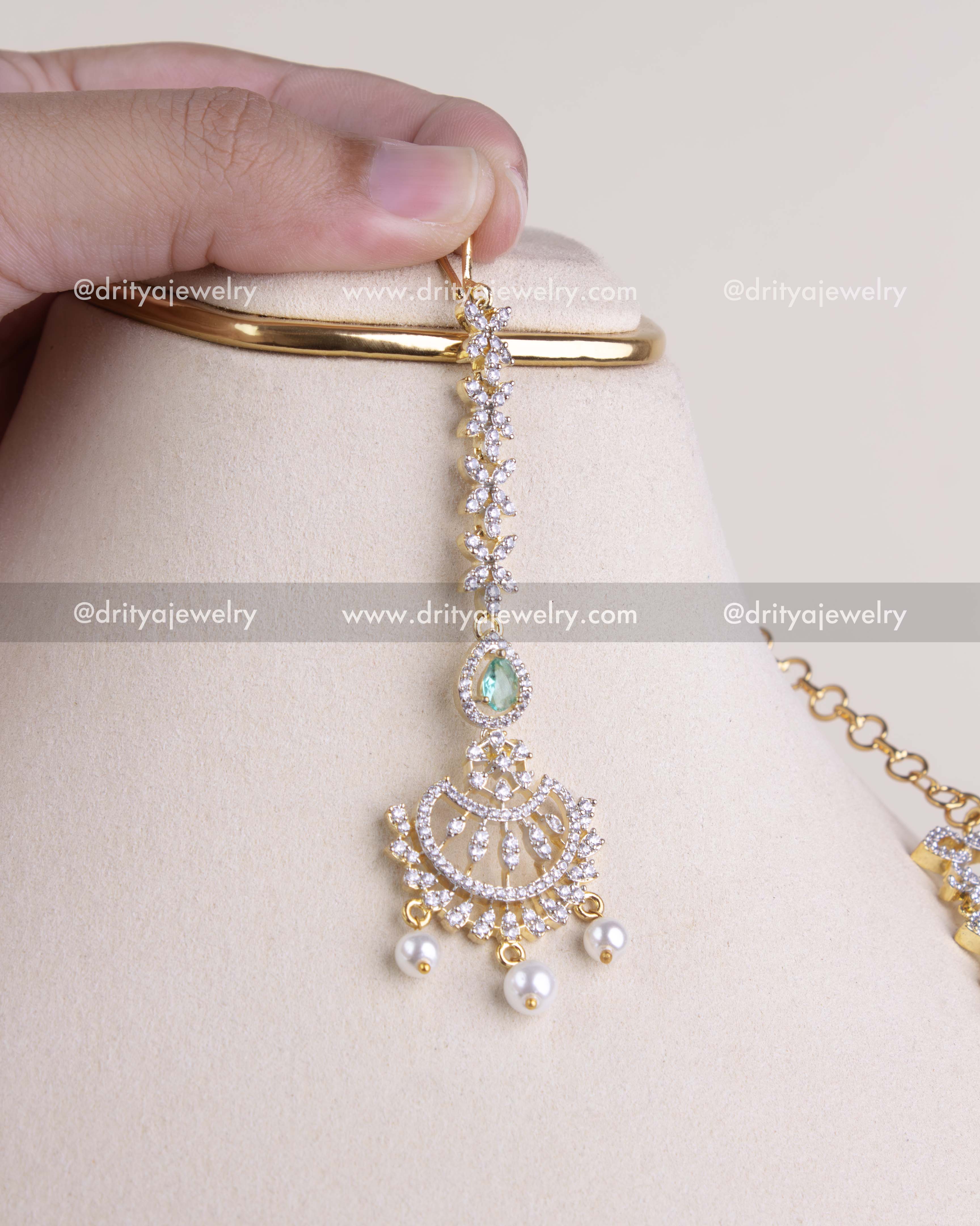 1208-RE maang tikka style pendant with CZ stones, emerald centre and pearl drops close-up