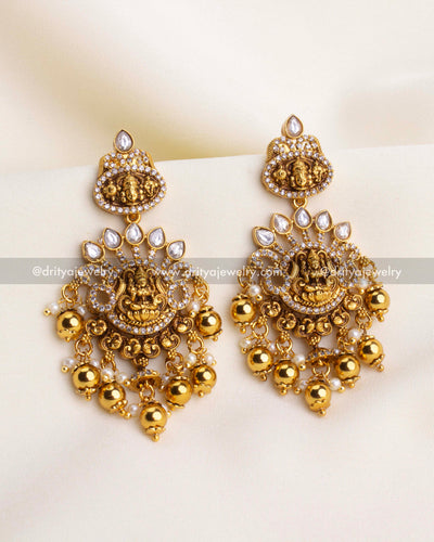 SKU 1200 temple-style Lakshmi earrings with gold beads and stone-studded detailing front view