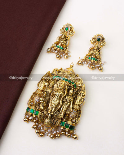 SKU 1221 Ram Parivar pendant with matching earrings laid on fabric