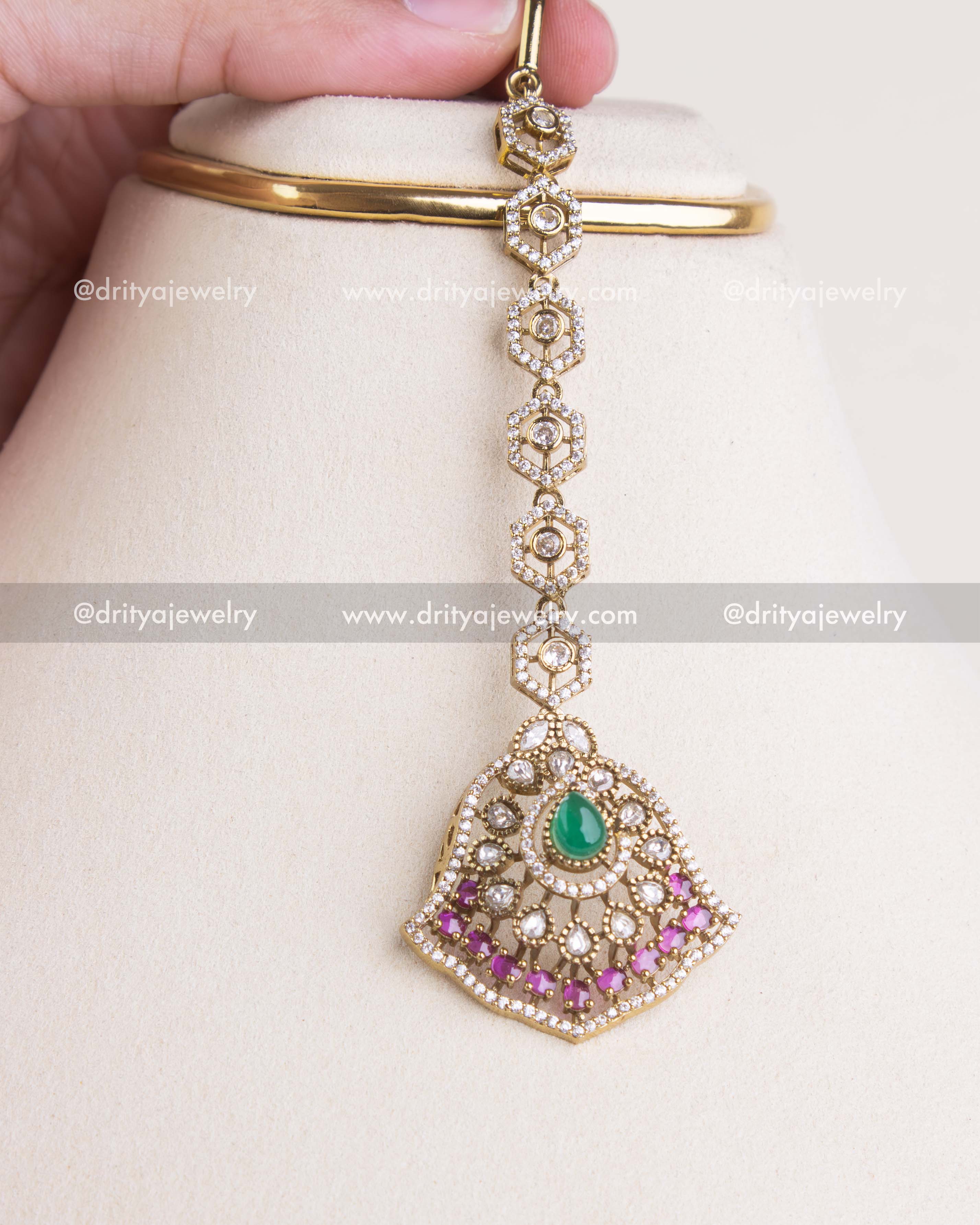 SKU 1234 maang tikka with green stone and pink accents detailed view
