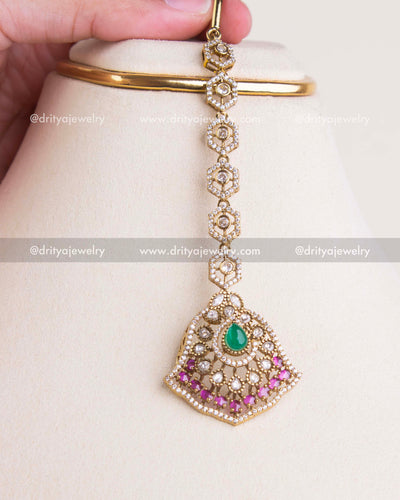 SKU 1234 maang tikka with green stone and pink accents detailed view