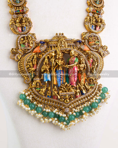 Central Srinivasa Kalyanam pendant with sculpted idols and green bead fringe