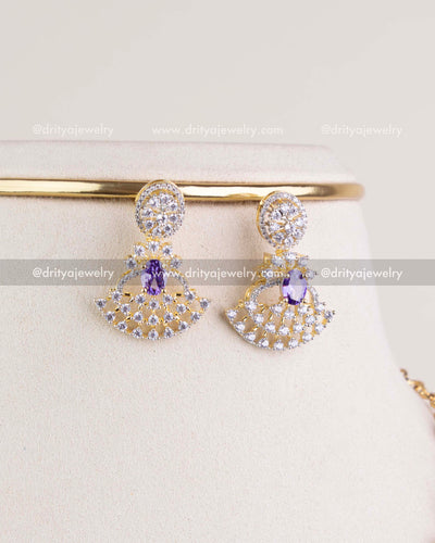 1211-PU matching CZ and purple stone fan motif earrings close-up view