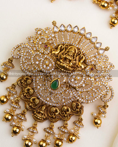 SKU 1200 close-up of Lakshmi god idol pendant with cz, kundan stones and gold bead drops