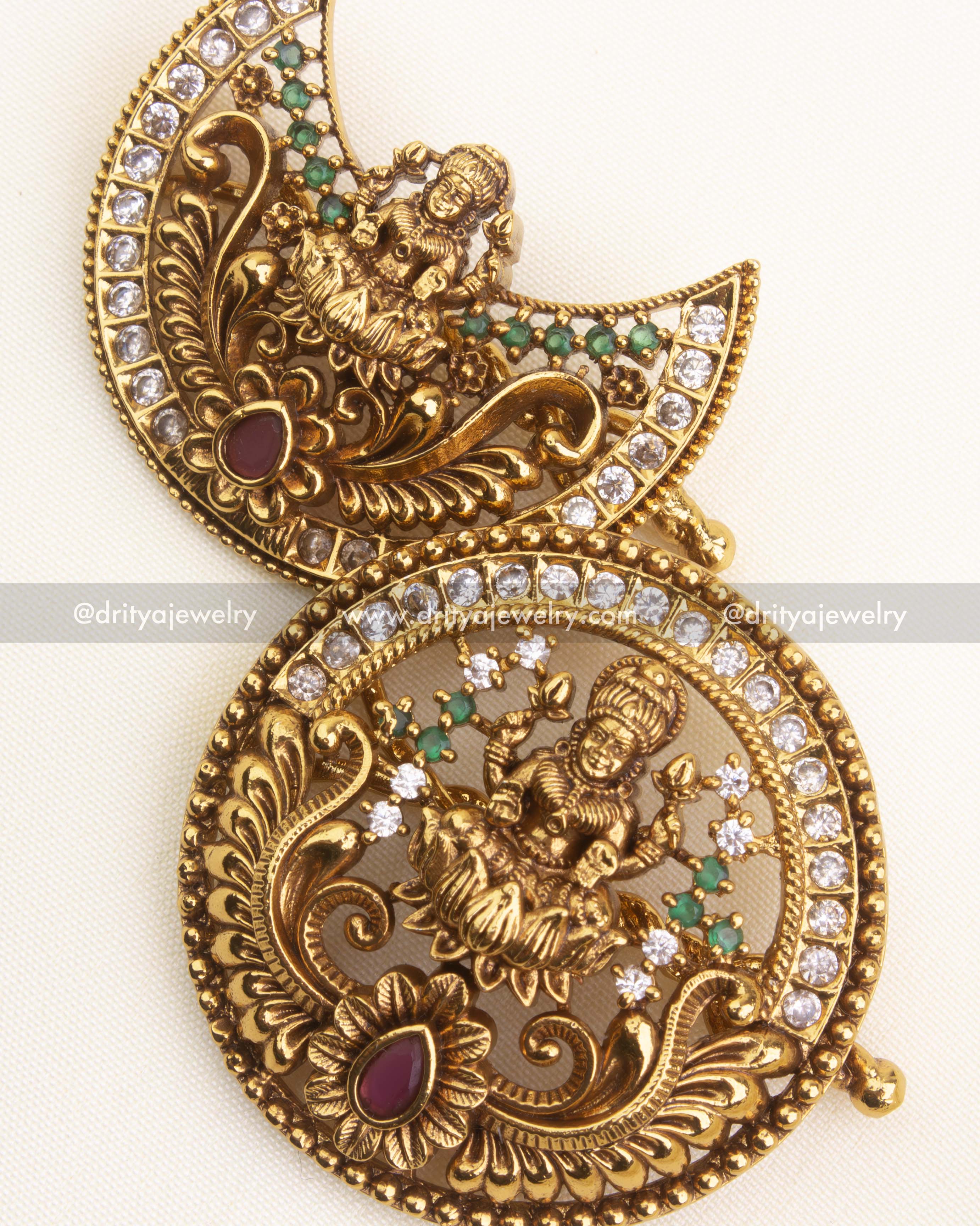 1172 - Close-up of antique sun and moon temple god idol hair pins with stone detailing