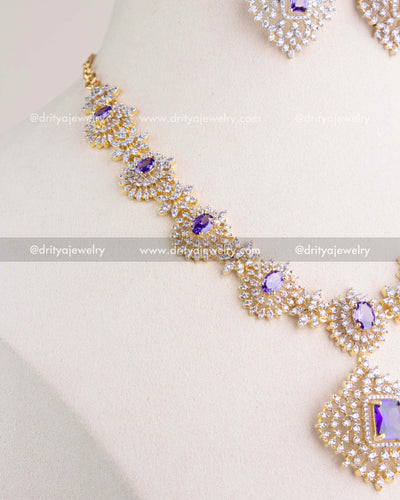 1210-PU side view of short necklace with alternating purple stones and CZ clusters