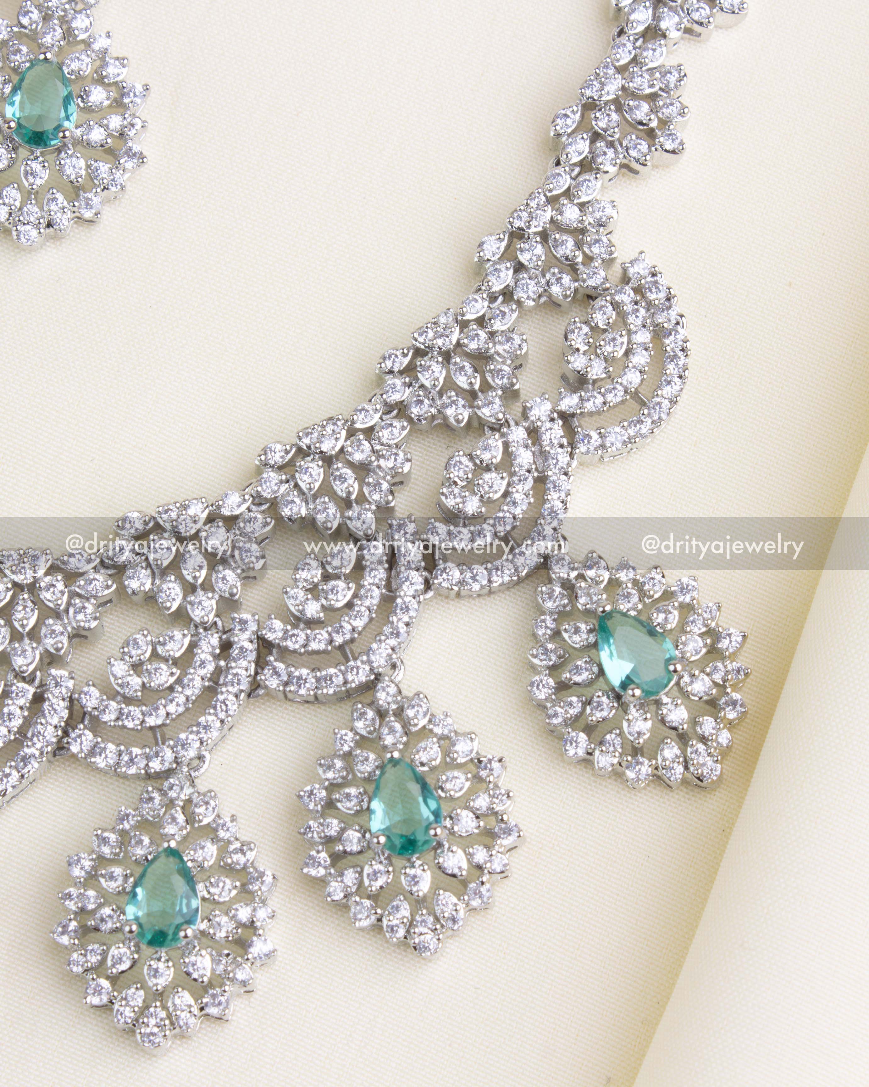 SKU 1136 Necklace Set - Close-up of necklace center detailing with emerald-style drops
