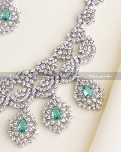 SKU 1136 Necklace Set - Close-up of necklace center detailing with emerald-style drops