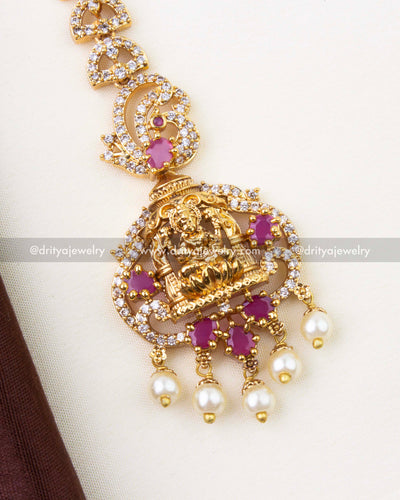 1297-R premium temple god idol maang tikka close-up with ruby stones and pearl drops
