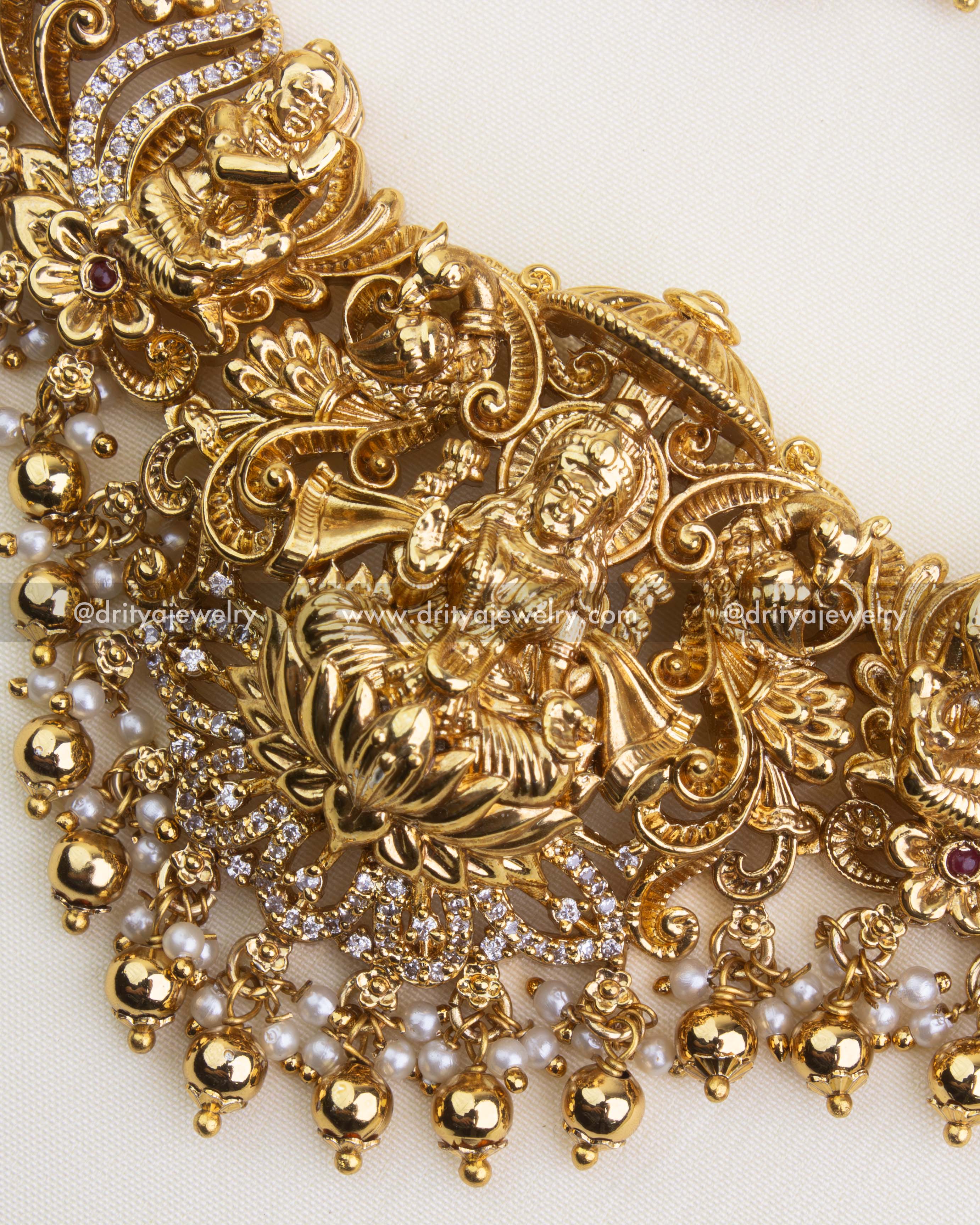 SKU 1121 Necklace Set - Detailed front view of central god idol pendant with layered drops