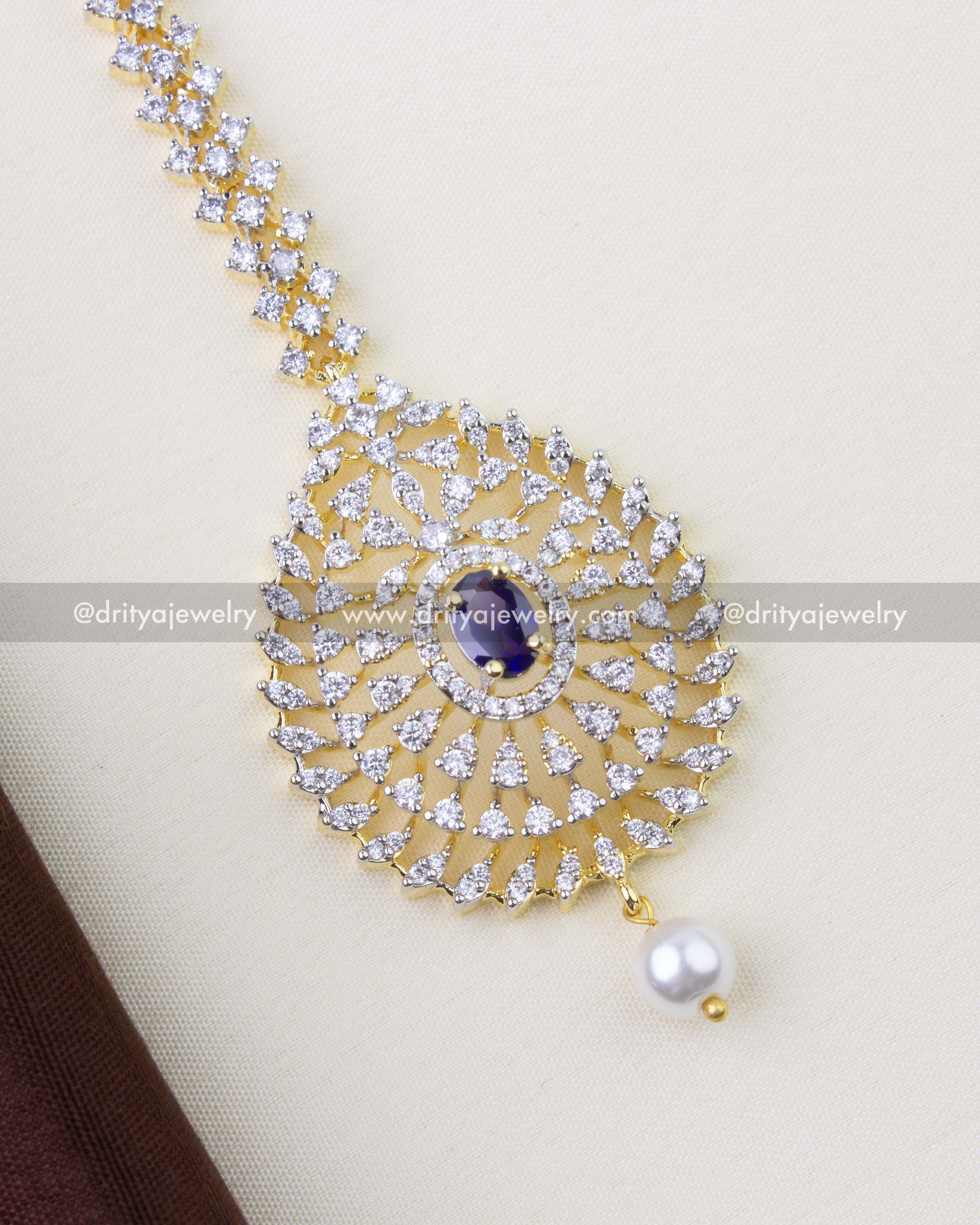 1293-PU close-up of purple stone and CZ detailing on maang tikka pendant