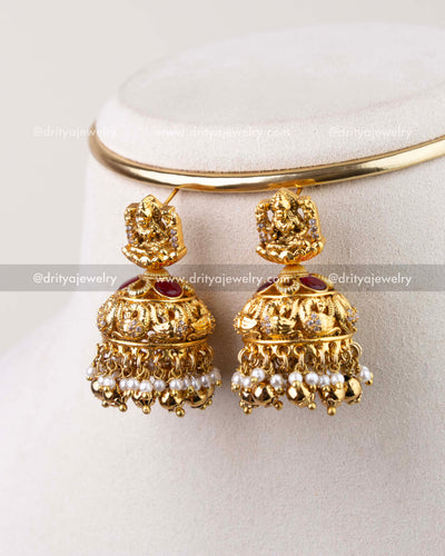 1282 - Side angle of god idol temple jhumka earrings showing nakshi detailing