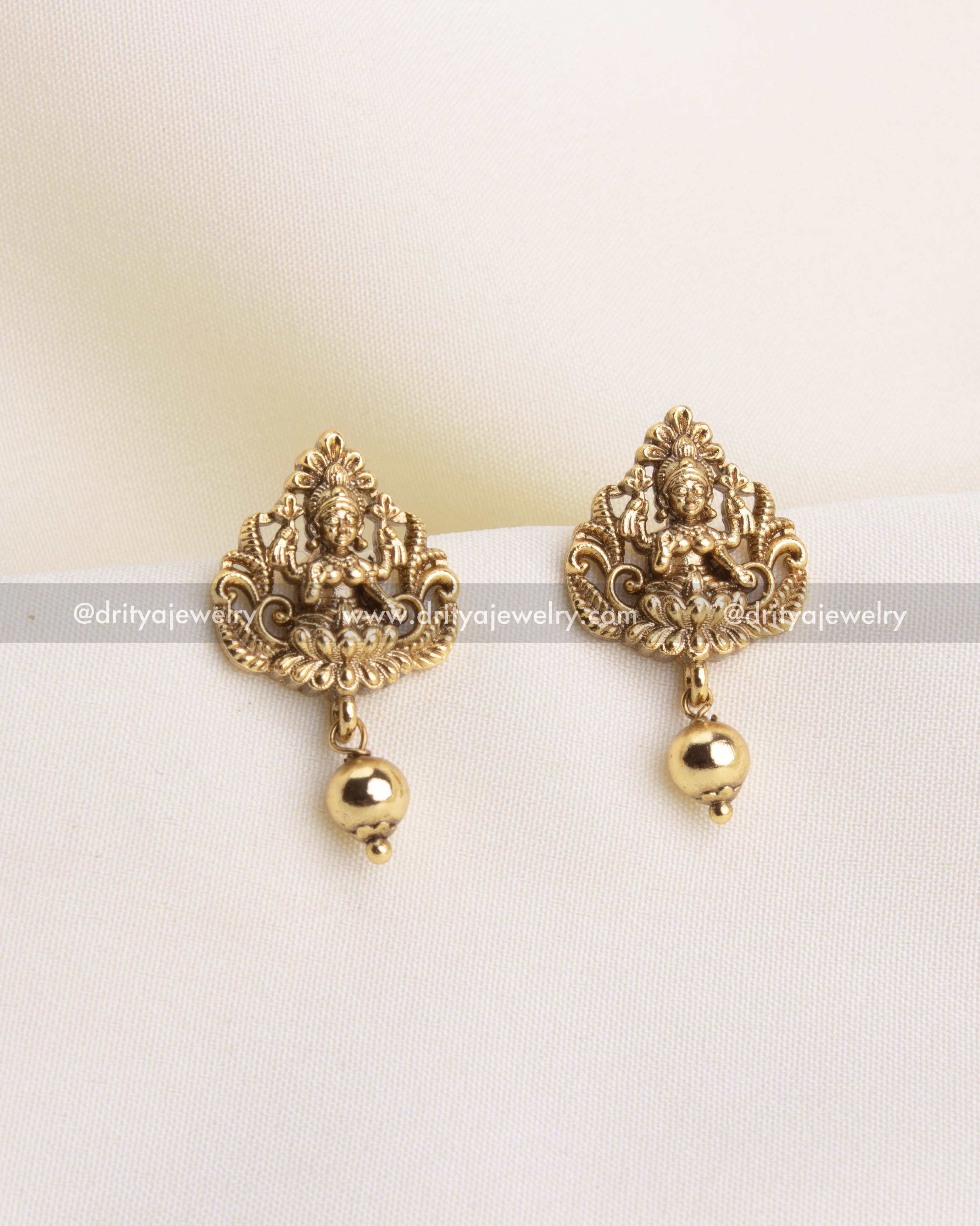 SKU 1139 - Necklace Set - Close-up front view of god idol stud earrings with ball drops
