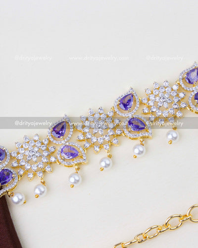 1289-PU close-up of purple teardrop stones, CZ clusters and pearl drops on hip chain