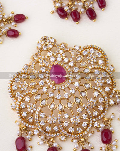 1269-R close-up of stone-studded pendant with red drops and pearls