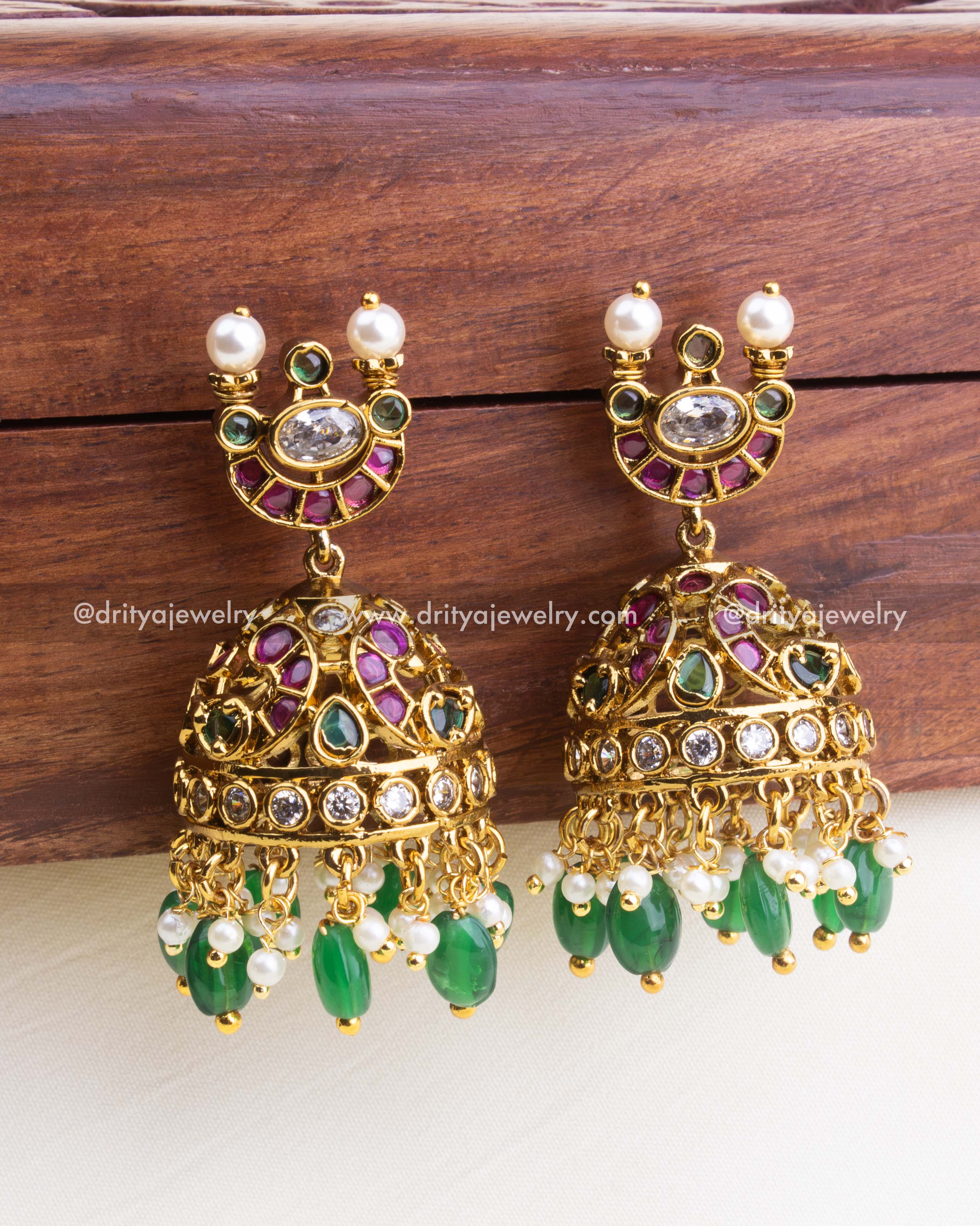 1202 - Jhumka earrings front view with green bead and pearl drops