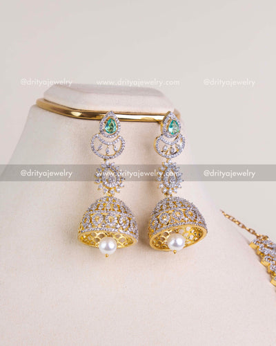 1208-RE big CZ jhumka earrings with emerald tops and single pearl drop