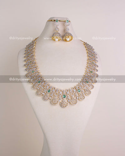 1208-RE full bridal CZ emerald necklace set with matching jhumka earrings on display bust