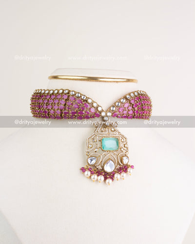SKU 1205 Necklace Set full front view of pink kundan choker with ornate pendant on display stand.