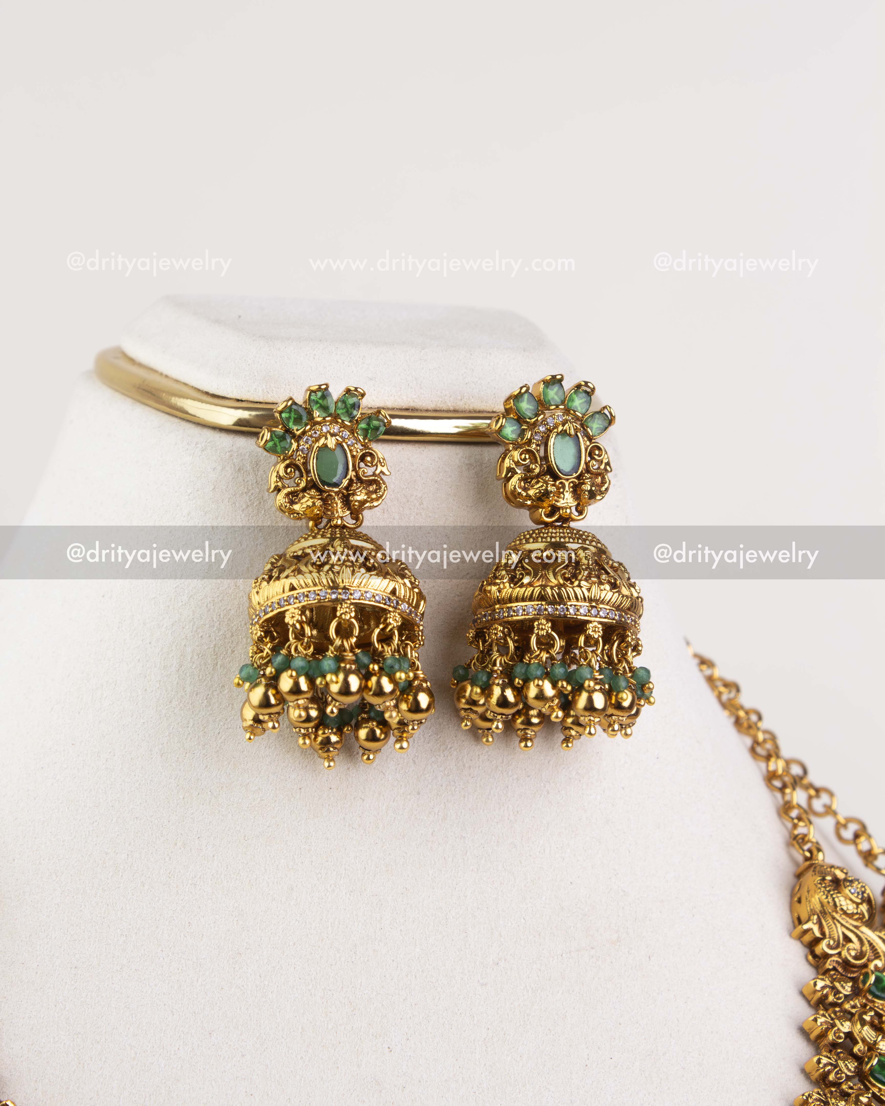 Close view of green stone jhumka earrings with bead drops from bridal temple necklace set 1244-SET