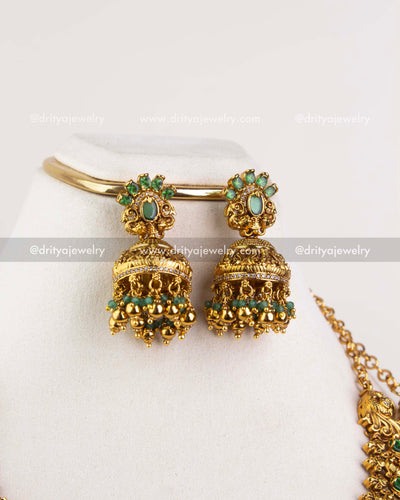 Close view of green stone jhumka earrings with bead drops from bridal temple necklace set 1244-SET