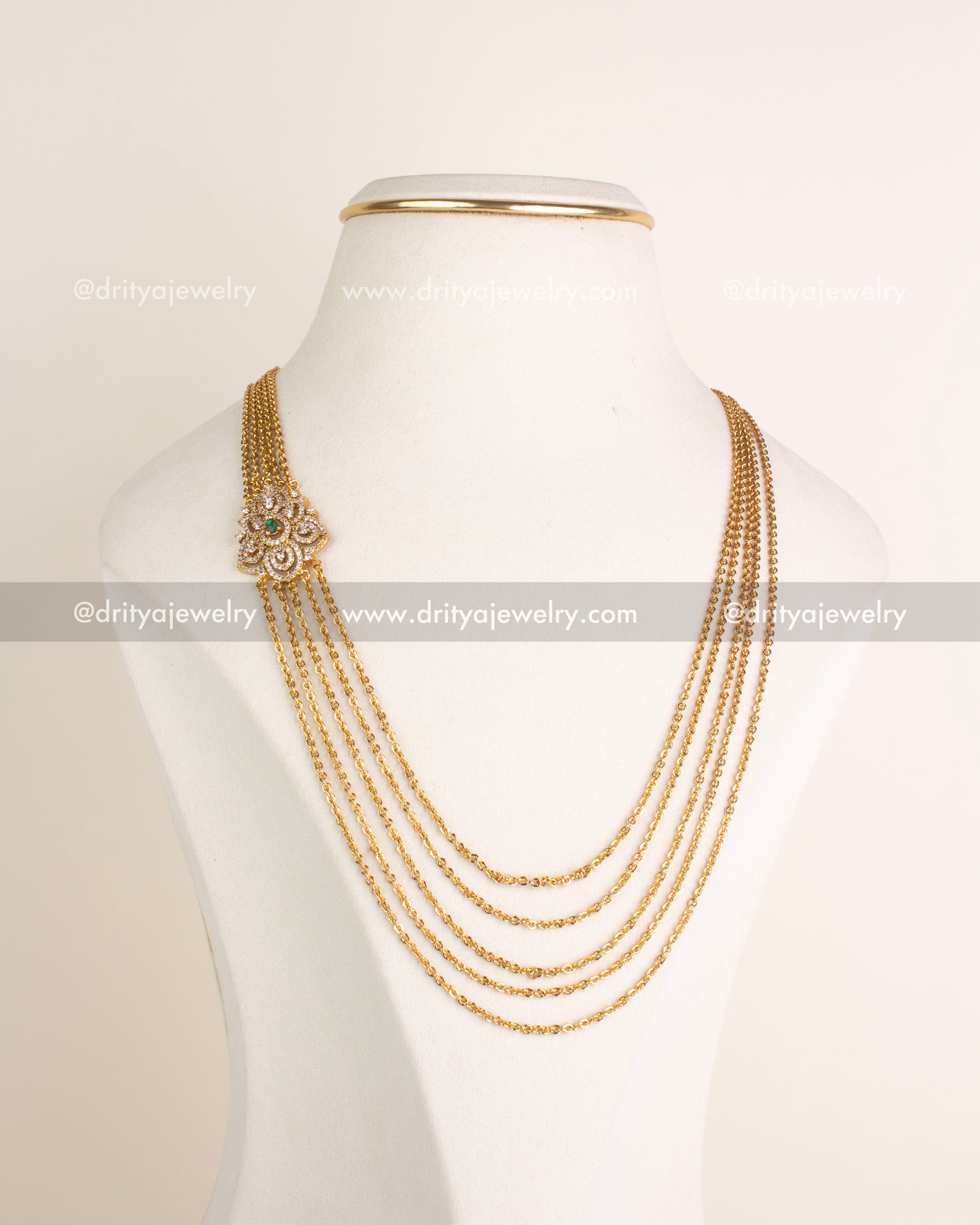Full view of multi-layered gold-tone CZ chandrahaar necklace on display bust, SKU 1120-G