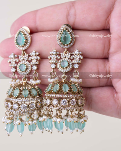 1257-MG - Close-up view of premium Victorian mint bridal jhumka earrings with CZ and bead hangings