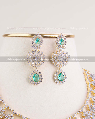 1209-RE matching long emerald and CZ dangler earrings front view
