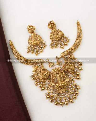 1263-GO premium nakshi short god idol necklace set with matching earrings laid flat
