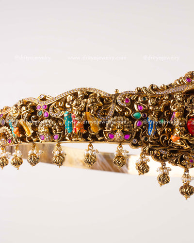 1206 - Side close-up of nakshi work and colourful stone detailing on temple waist belt