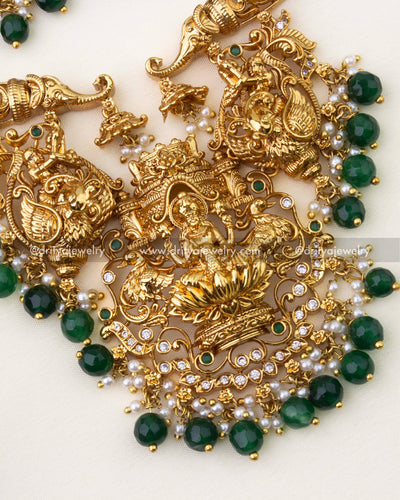 1263-G close-up of god idol pendant with emerald green beads and pearls