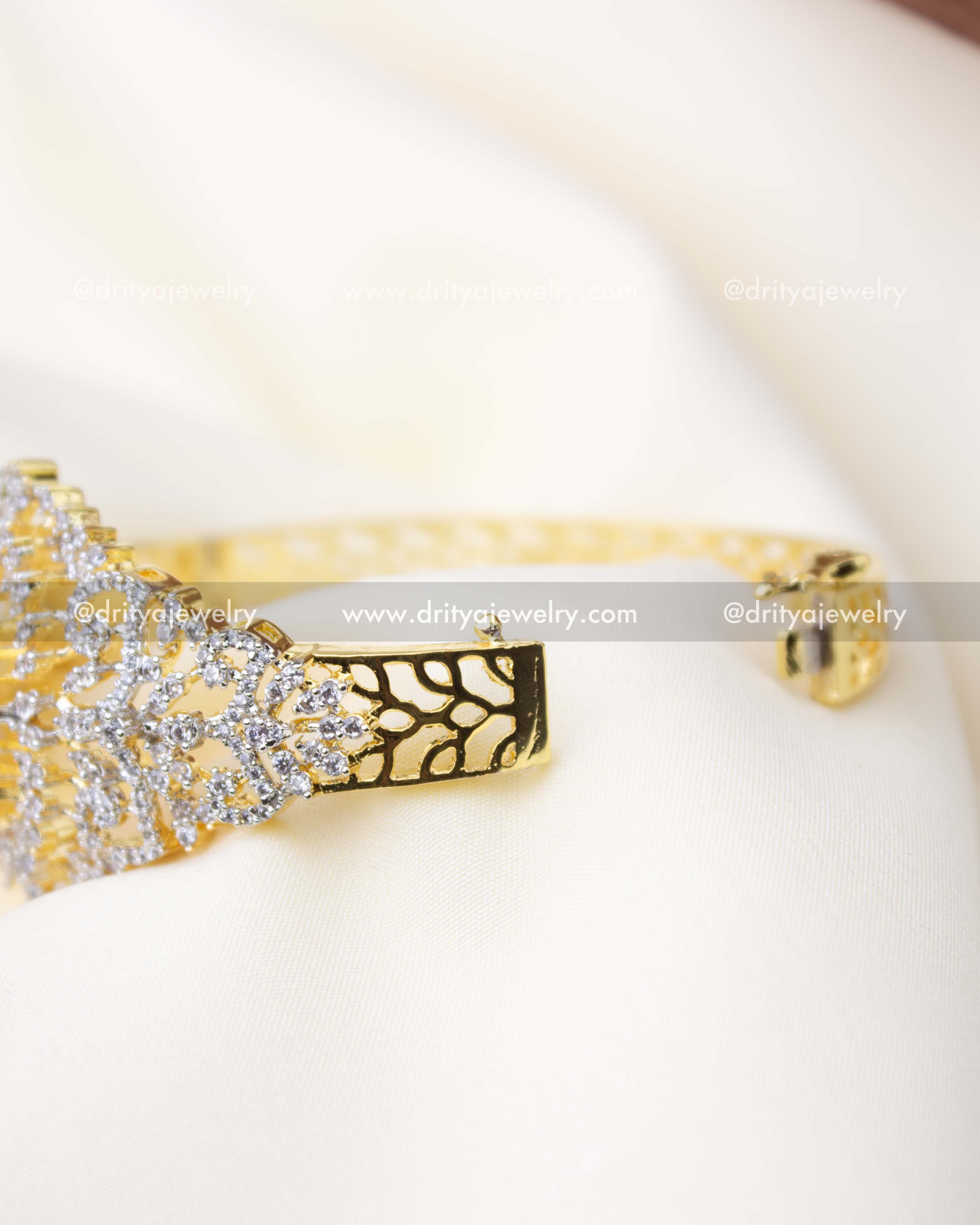 Side view of openable gold-tone kada with diamond replica detailing and cutwork band, SKU 1295-BP