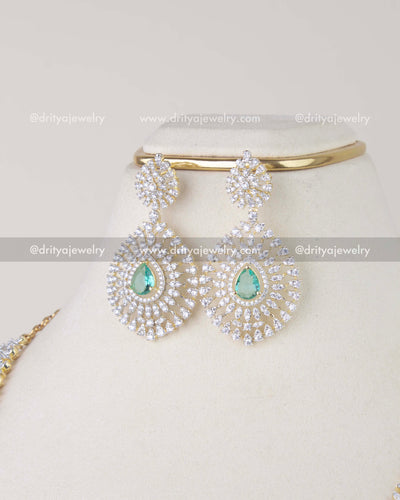 1214-RE emerald CZ dangler earrings front view