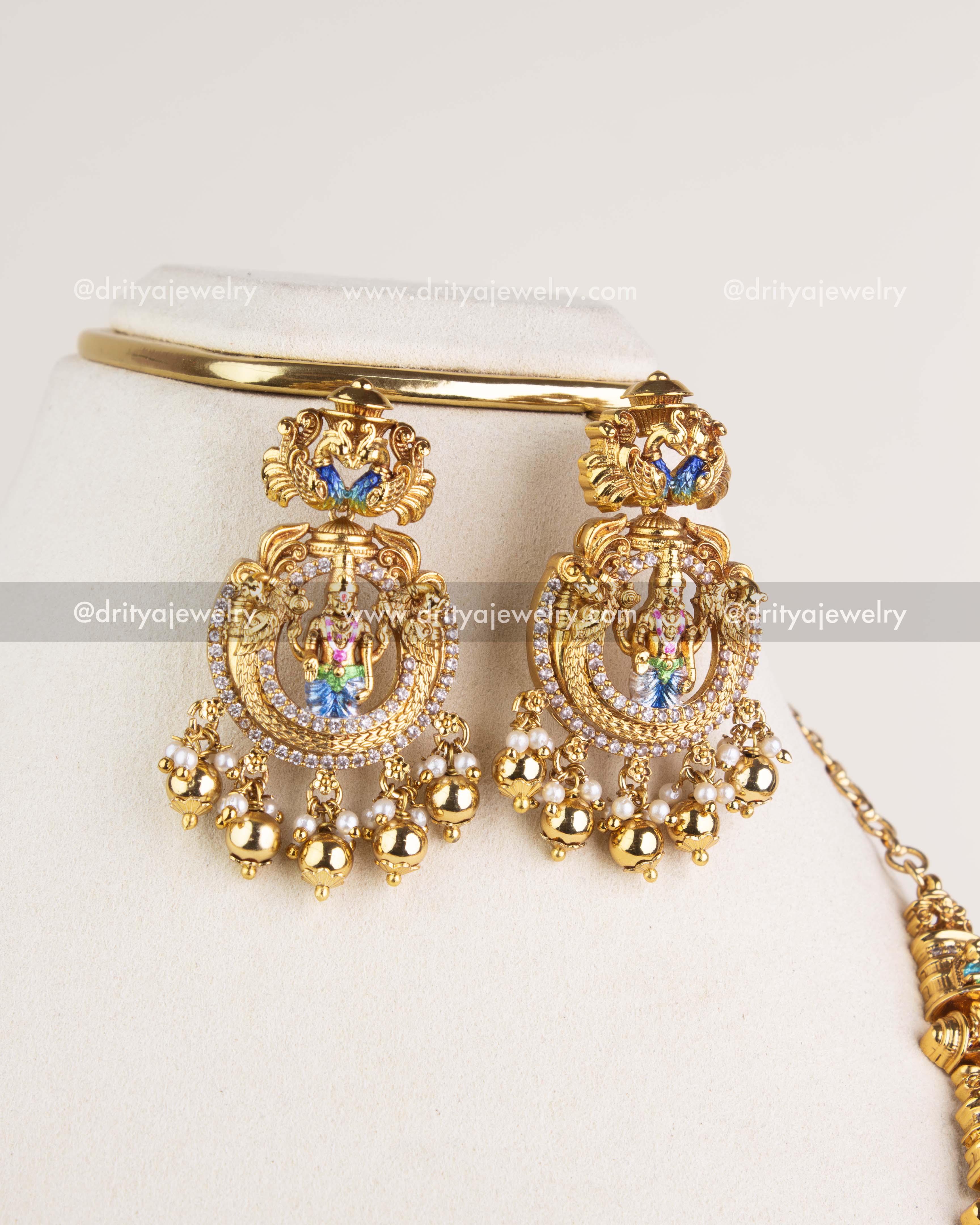 1220 Matching meenakari temple earrings with pearl and bead drops close-up