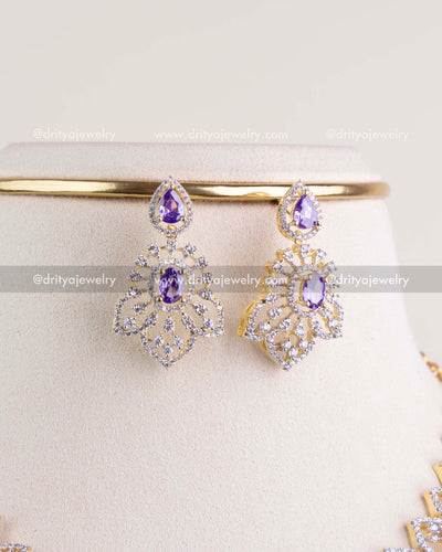 1232-PU matching dangler earrings close-up with purple stones
