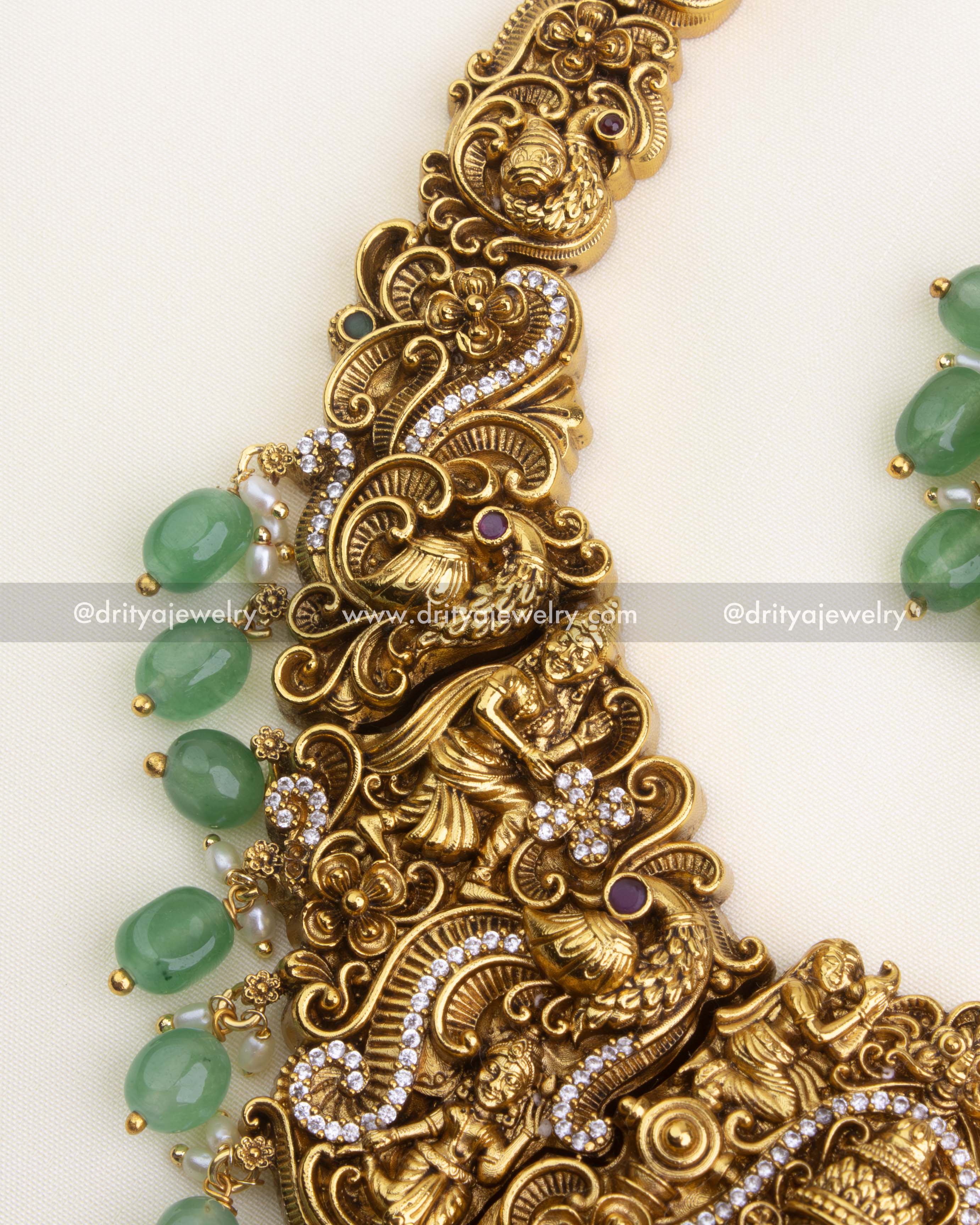 1195 - Close-up of nakshi work and green bead drops on temple necklace side