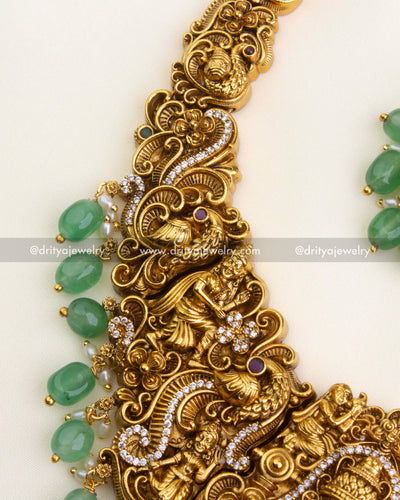 1195 - Close-up of nakshi work and green bead drops on temple necklace side