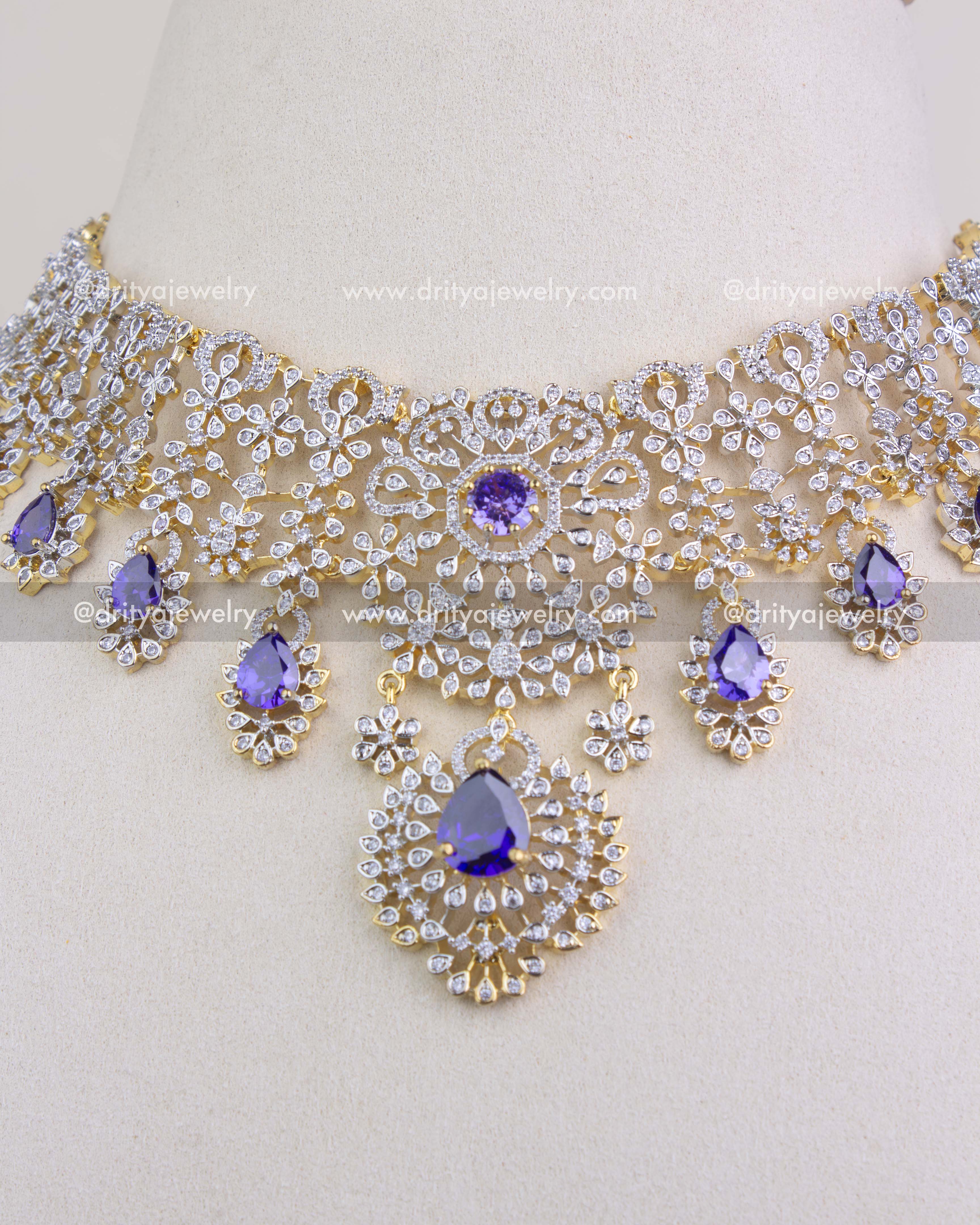 Center close-up of purple stone pendant on CZ short necklace with dual-tone finish