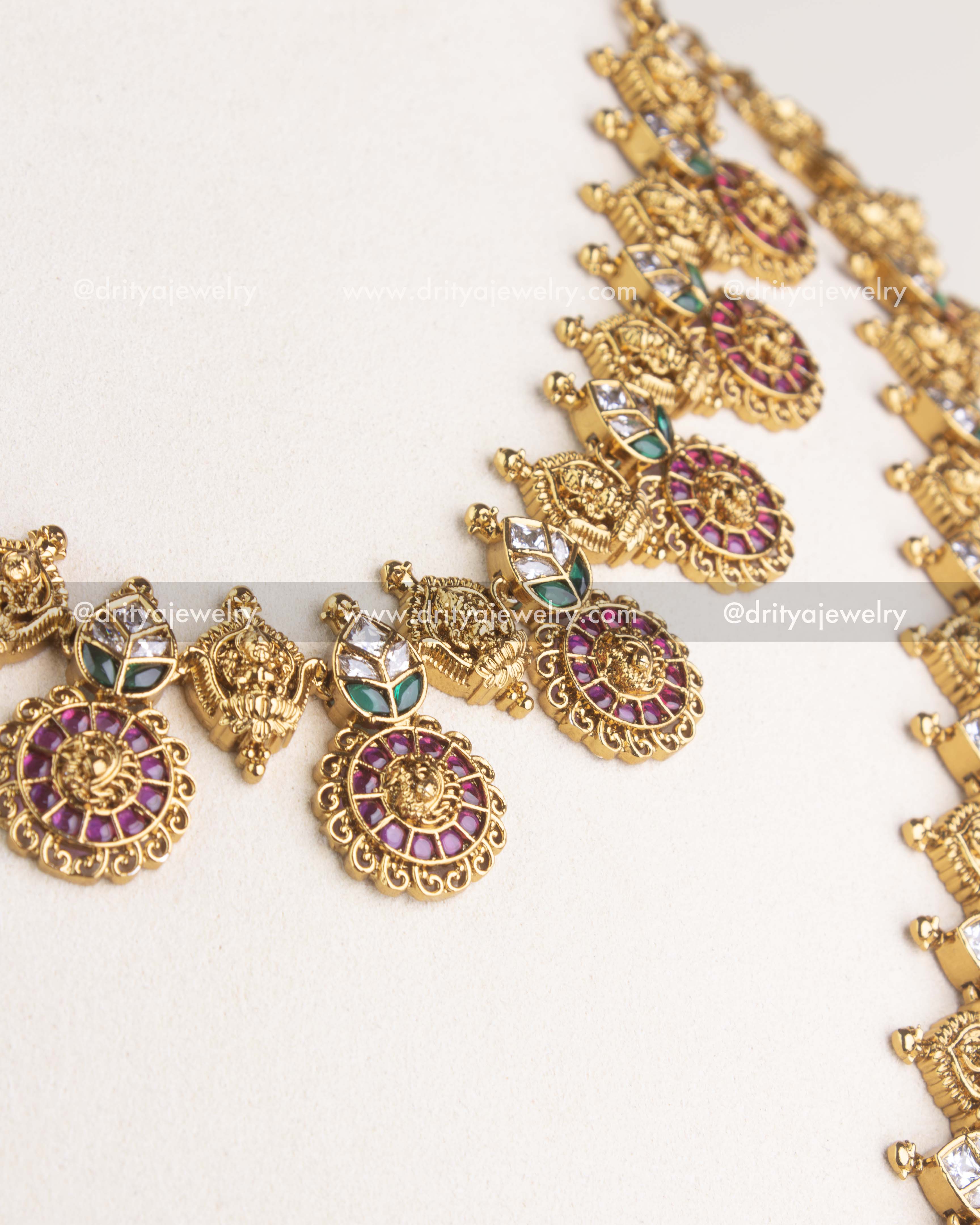 1191 - Necklace Set - Angled view highlighting stone-studded god idol motifs and circular kemp drops