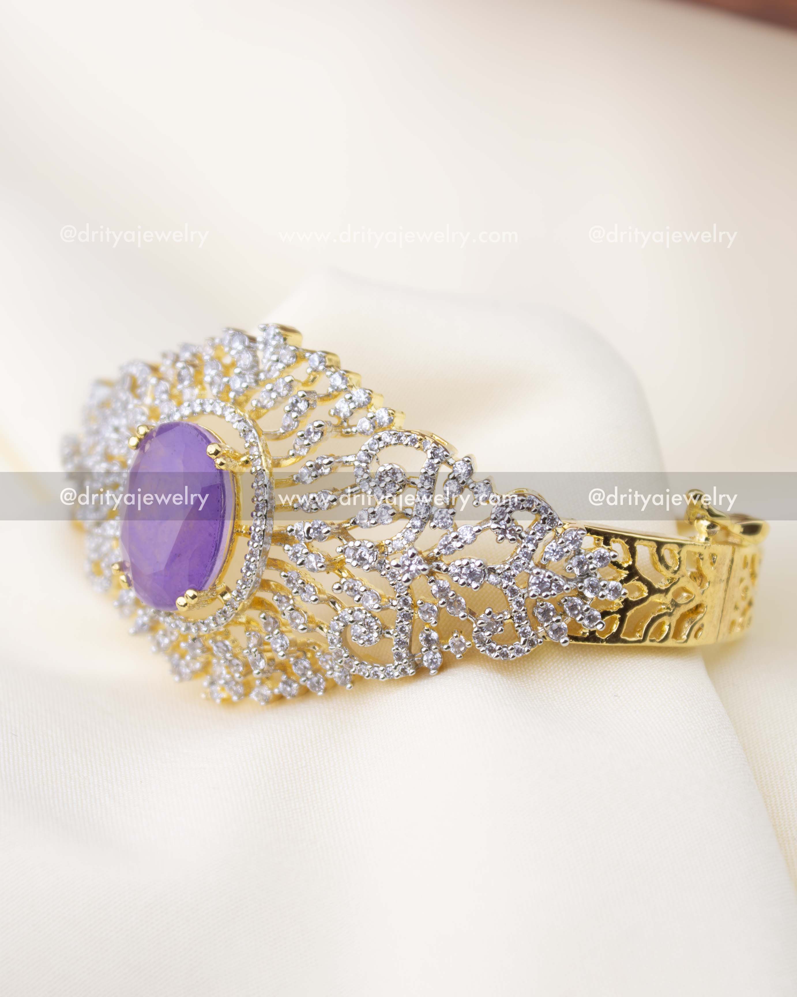 1295-PU side view of purple stone diamond replica kada on fabric